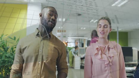 animation of financial data processing over diverse business people discussing work at office