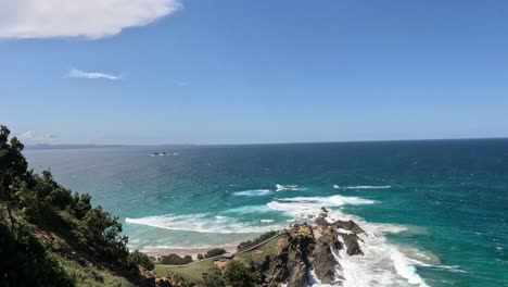 waves crashing against rocky cliffs by the sea