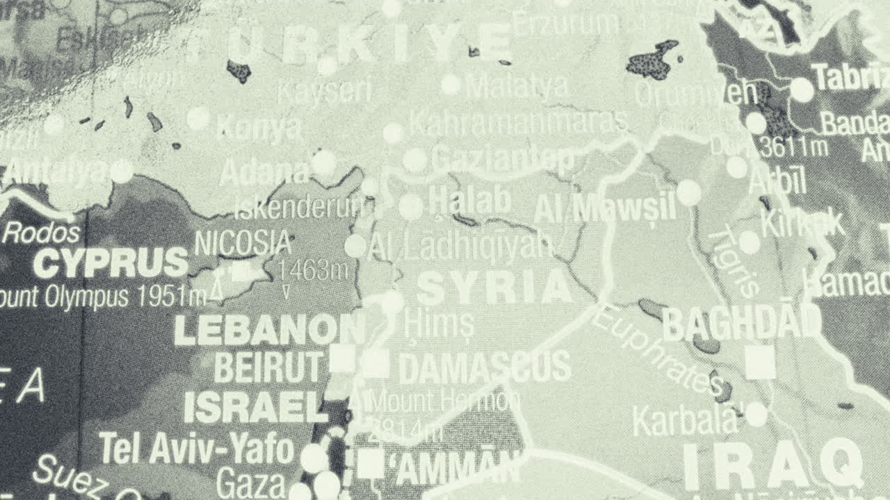 A close-up, monochrome map showing the Middle East region with countries and major cities