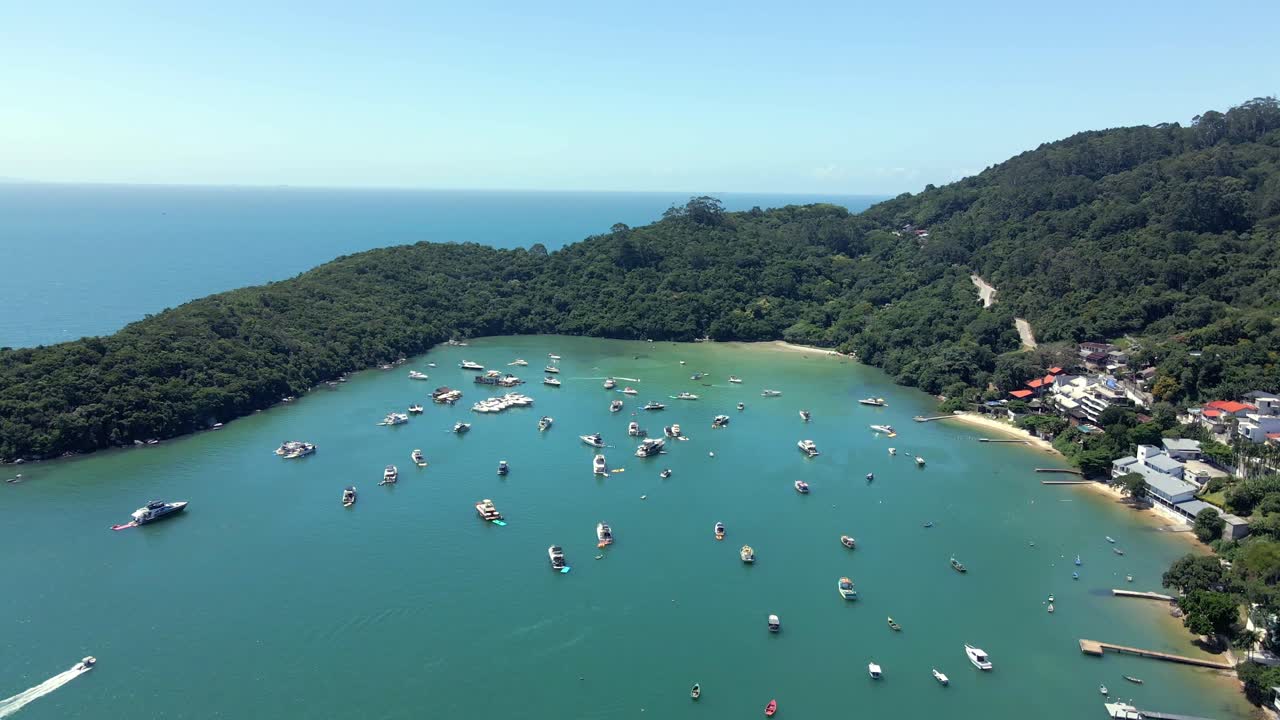 Sailboats At The Calm Protected Beach Of Caixa D'Aco In Porto Belo, Santa Catarina, Brazil. Aerial Drone Shot