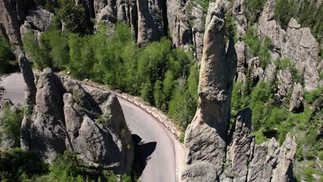 aerial view of the needles, rock formations and road in black hills, custer state park, south dakota usa