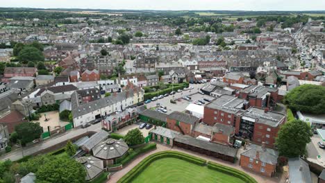 Houses-and-streets-Newmarket-town-Suffolk-UK-panning-Aerial-drone