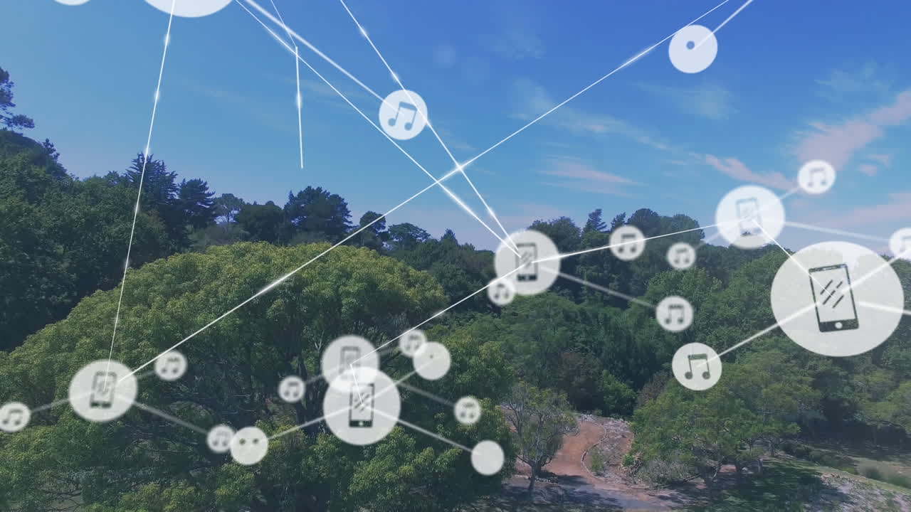 구름이 가득한 하늘을 배경으로 초록색 에 있는 나무의 공중 전망 위에서 선으로 연결된 아이콘의 애니메이션