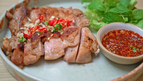 savoury grilled chicken with chilli and garlic on plate