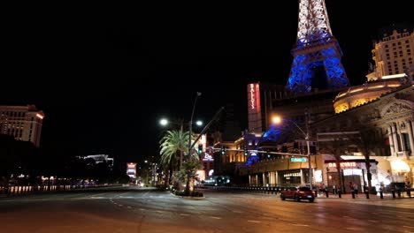 nighttime view of the las vegas strip featuring the eiffel tower replica at paris las vegas