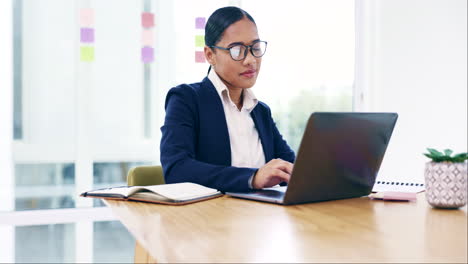 laptop, office and professional woman typing