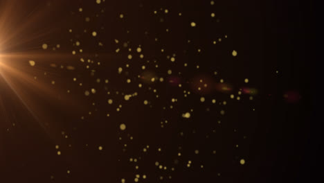 animación de puntos dorados que se mueven sobre un fondo negro