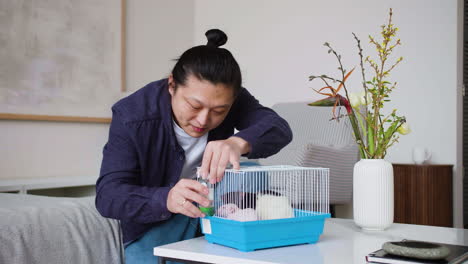 man giving water to rats