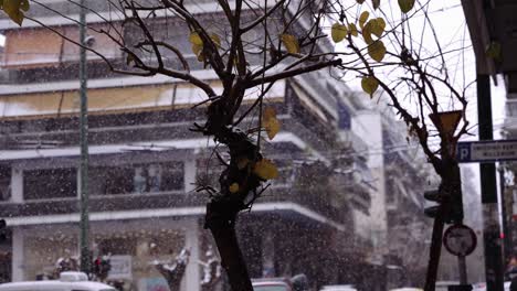 shot-of-Athens-city-centre-neighbourhood-while-is-snowing-,-bad-weather-Greece