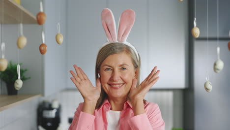 woman wearing bunny ears for easter