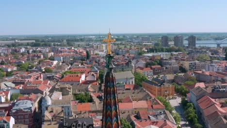 spire of the name of mary church and the beautiful city of novi sad, vojvodina, serbia - aerial drone shot