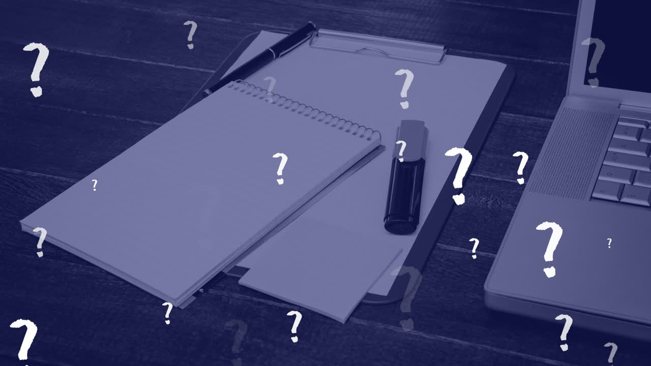 Animation of question marks floating over notepads and laptop on office desk