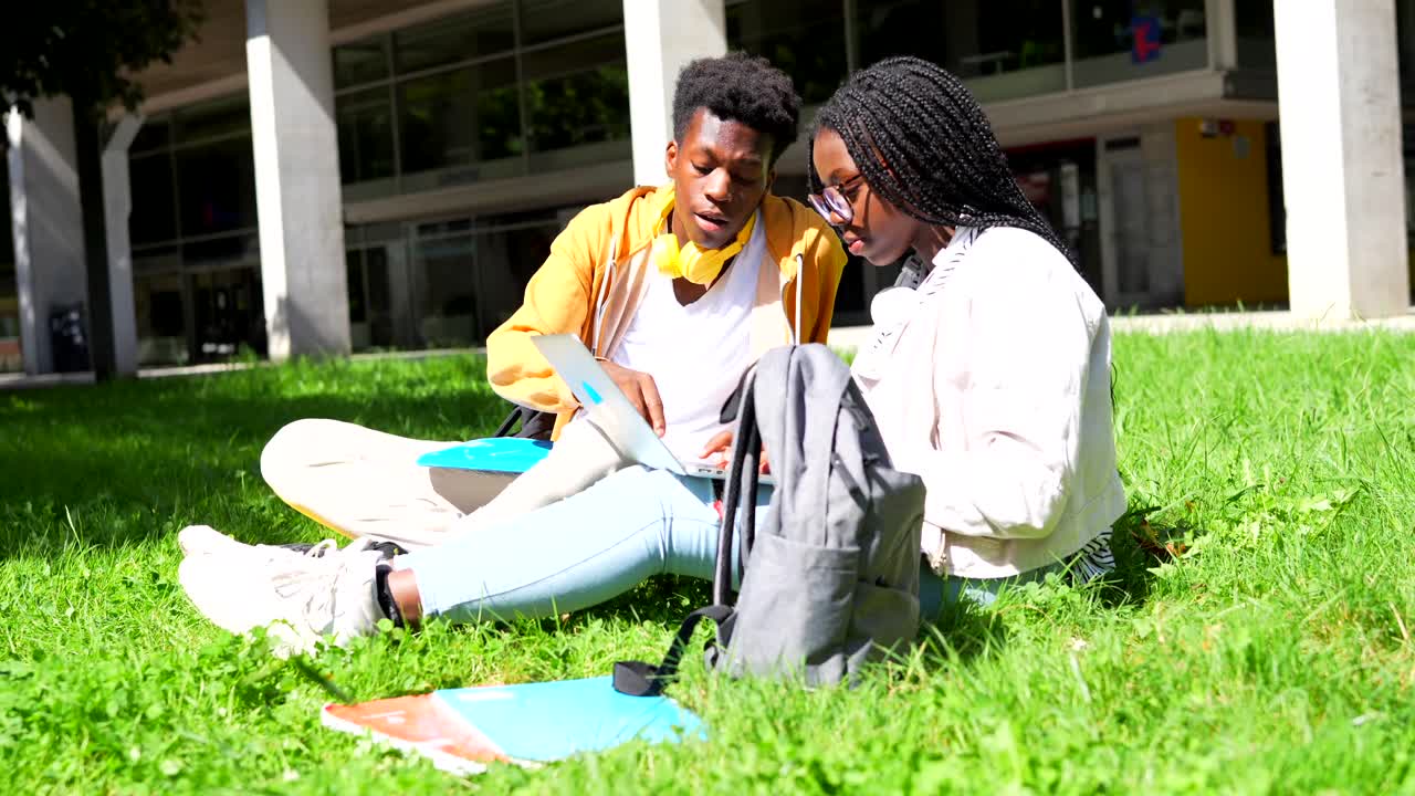 Students studying together on campus