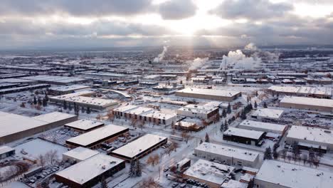 an aerial shot of the winter god-rays in freezing calgary