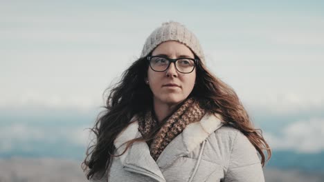 young caucasian woman thoughtful and inspired by nature in a slow-motion clip