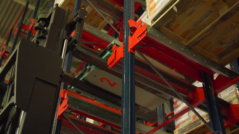 forklift operating in a high-bay warehouse