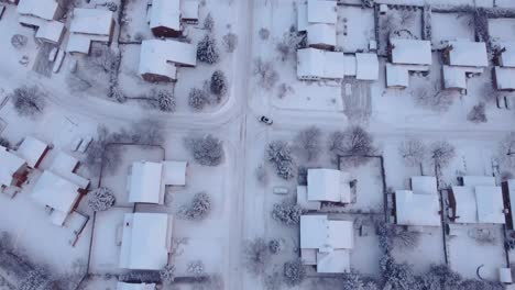 snow covered aerial view of city neighborhood