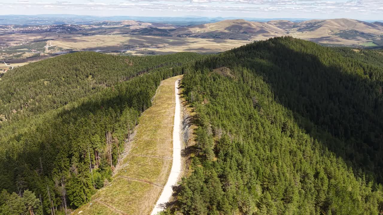Drone Shot of Road and Pine Forest on Hills and Horizon of Zlatibor Mountain, Serbia
