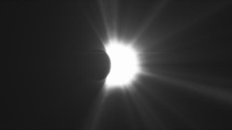 rays of sun-light, moon covering the sun during total solar eclipse