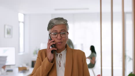 Happy,-phone-call-or-senior-business-woman