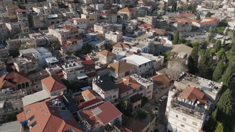 dense roof top flight in old town region of ancient nazareth, israel