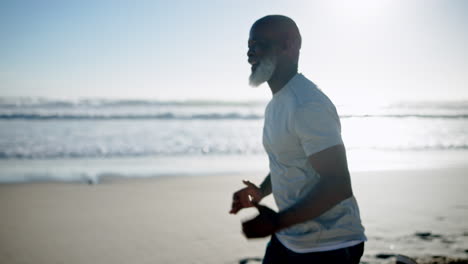 man running on a beach