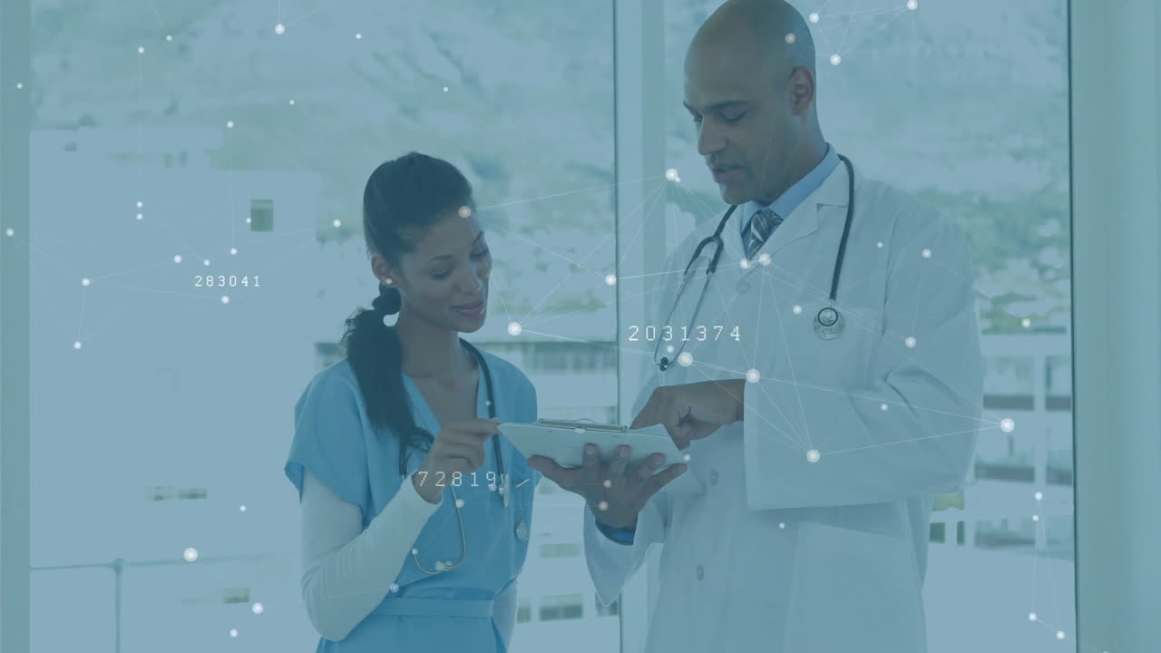 In hospital, doctors discussing patient data with digital animation overlay