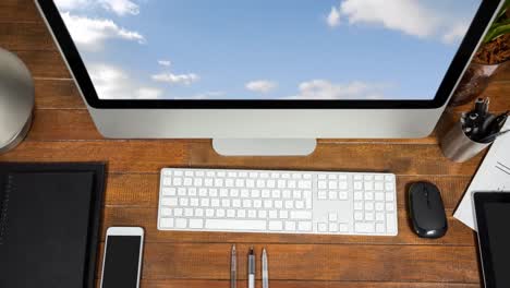 blue sky and clouds on computer monitor