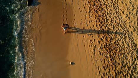 Tourists-walking-at-beach-on-a-sunny-day-4k