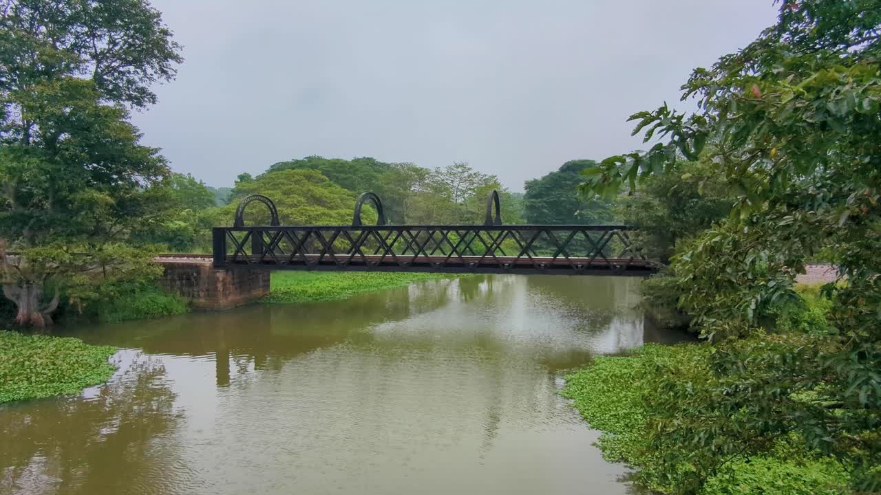 Scenic view of old Manampitiya rail bridge from early 20th century steel bridge over Mahaweli River Sri Lanka