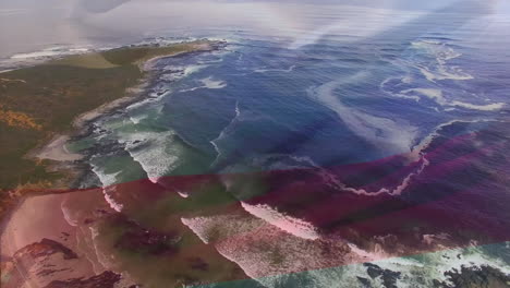 digital composition of waving russia flag against aerial view of waves in the sea