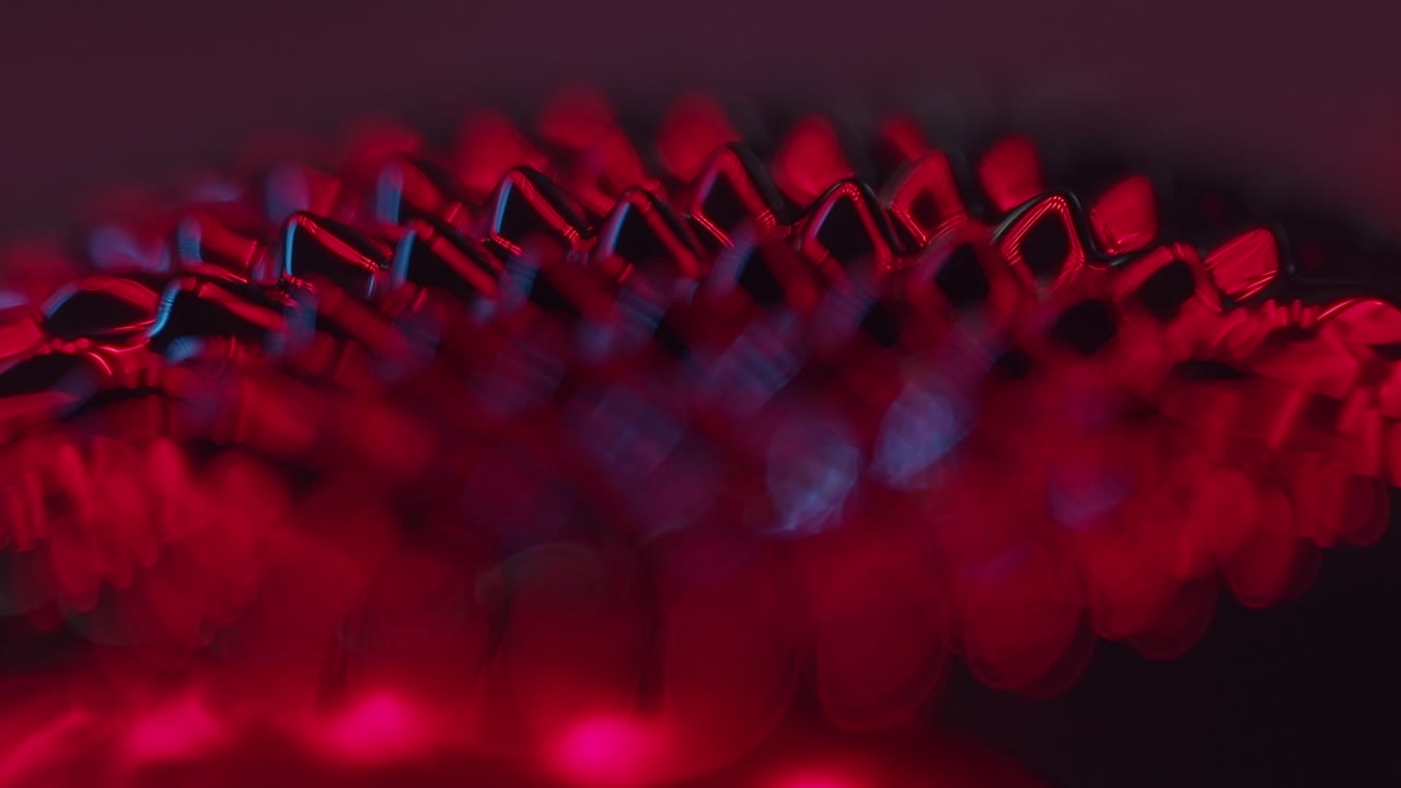 fluid forming spikes in a dark abstract atmosphere