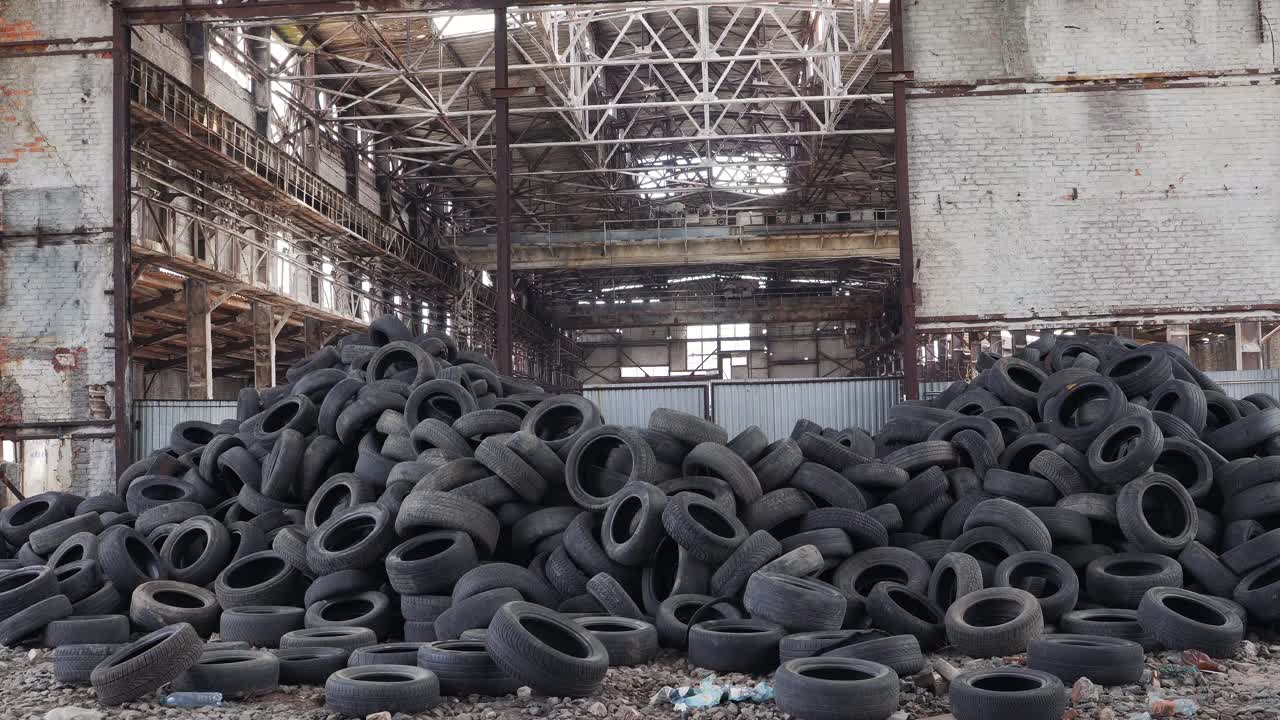 Dump Of Tires From The Car. Pile of used tires lays at a special dump