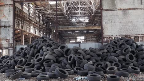 dump of tires from the car. pile of used tires lays at a special dump