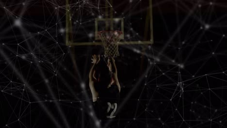 animación de redes de conexiones sobre el jugador de baloncesto masculino de raza mixta en el gimnasio