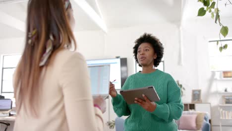 Montage-of-diverse-business-female-colleagues-working-in-casual-office,-slow-motion