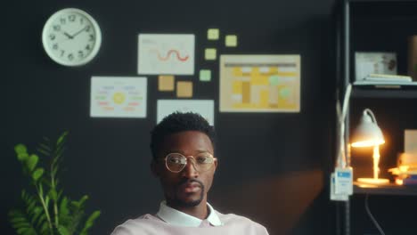 portrait of confident african american businessman in office