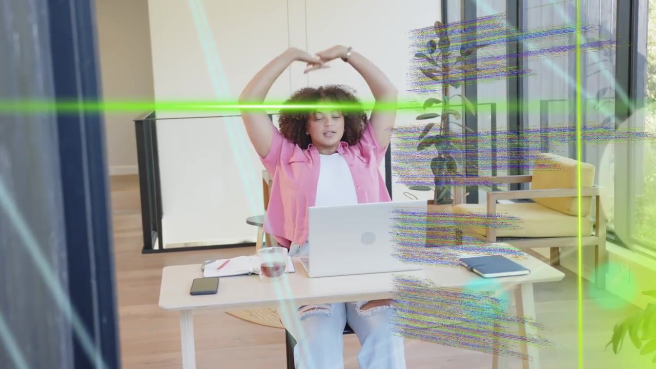 Green overlays sweeping across view revealing woman working laptop for remote work, stretching