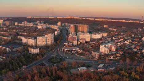 establishing aerial shot of chisinau, moldova at sunset