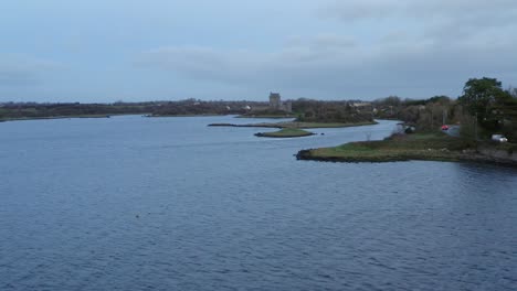 Aerial-tracking-shot-flying-over-Dunguaire-Castle