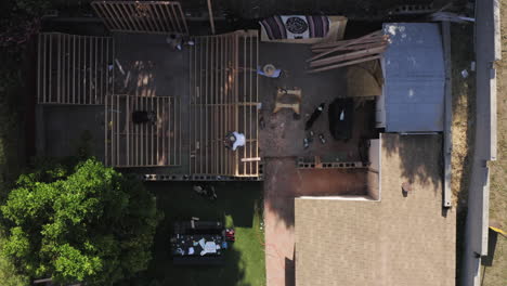 Aerial-shot-of-a-mini-ramp-construction-site-with-people-busy-doing-their-work