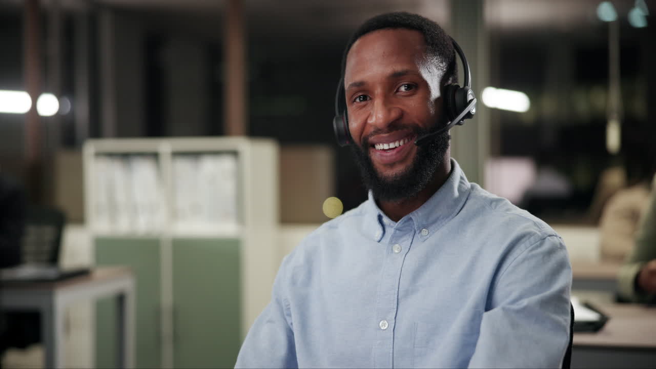 A customer service agent wearing a headset in an office