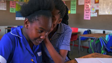 Schoolgirls-talking-in-a-lesson-at-a-township-school-4k