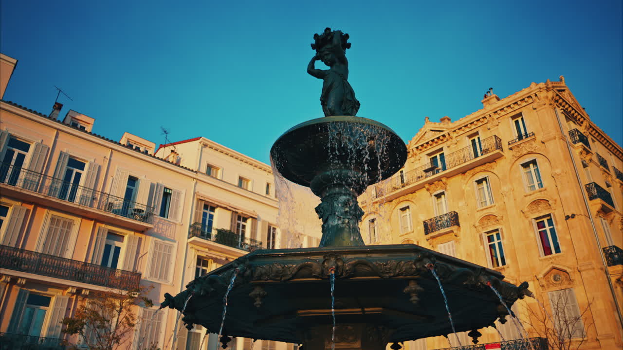 Cannes, France - December 14, 2024: Water fountain at the Place Charles de Gaulle at sunset