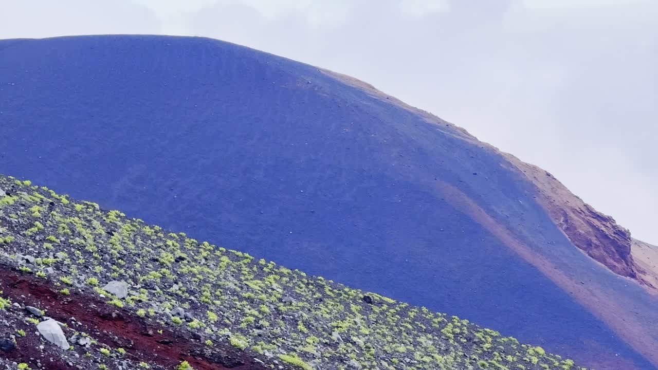 A thrilling trek up Mount Fuji takes you through diverse landscapes, from lush foothills to rocky slopes, ending with panoramic summit views