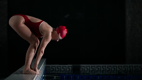 woman diving into a pool