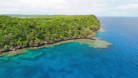 cinematic drone flight around remote island in fiji