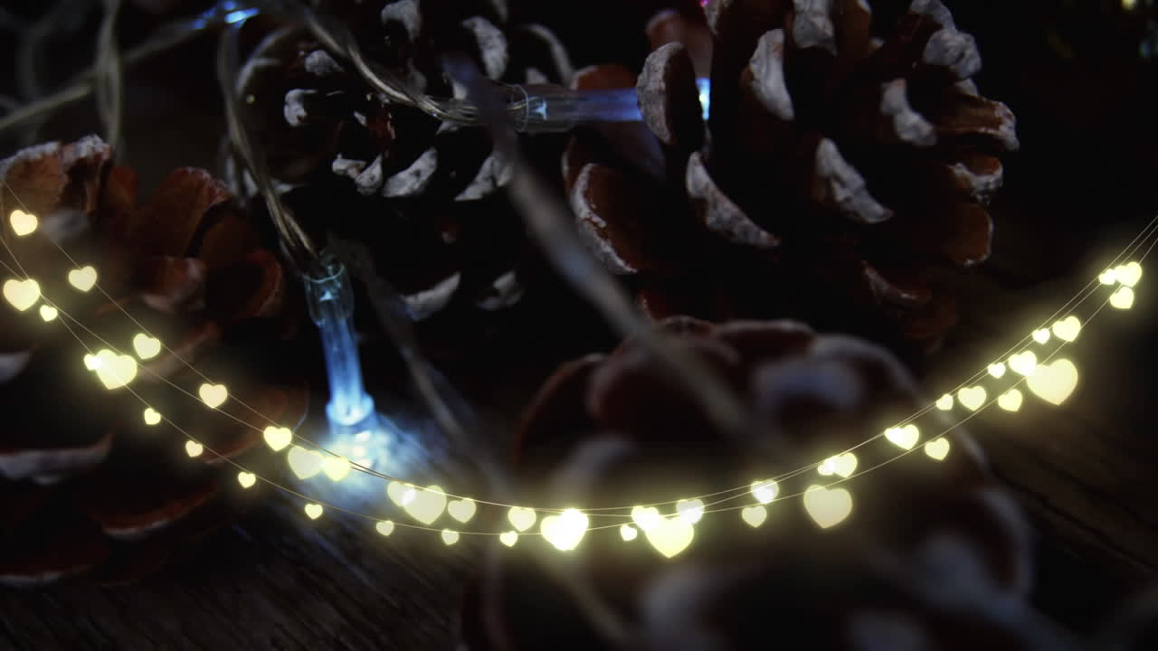 Animation of heart string lights and pine cones
