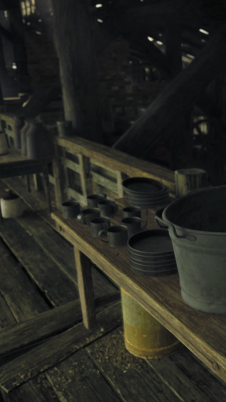 Rustic workshop with wooden tables and metal containers during daylight hours