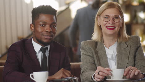 portrait of multiethnic male and female coworkers in restaurant